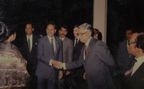 Shaking hands with the then President Hussain Muhammad Ershad 
